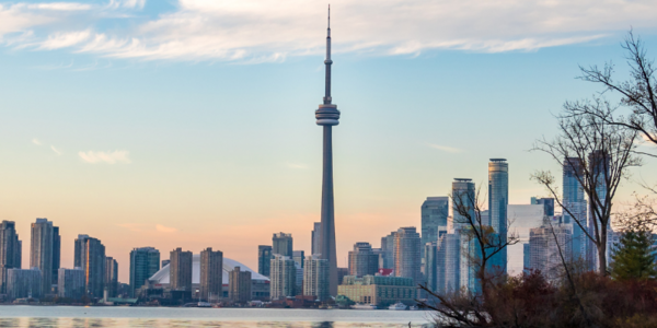 An image of the Toronto skyline, viewed across the lake during winter