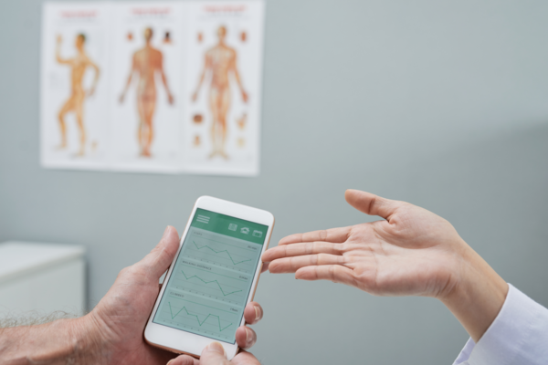 A health-tracking smartphone app showed in a medical office setting