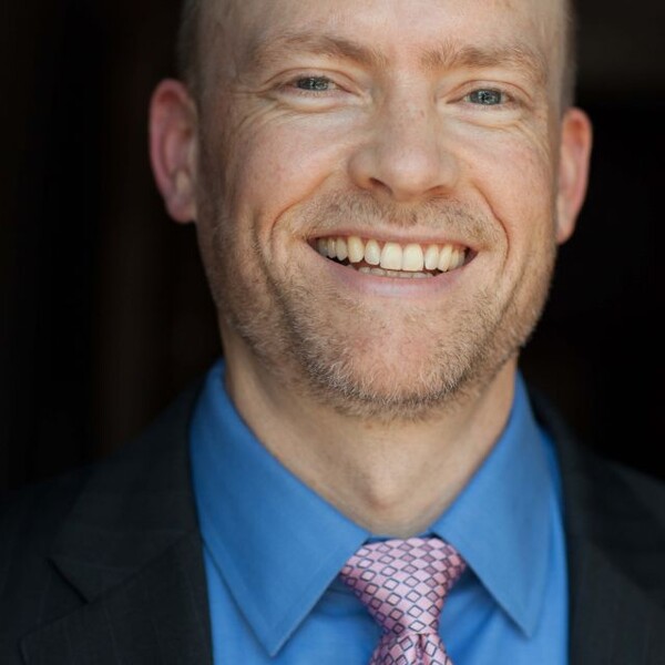 A portrait photo of Dr. Jamie Feusner